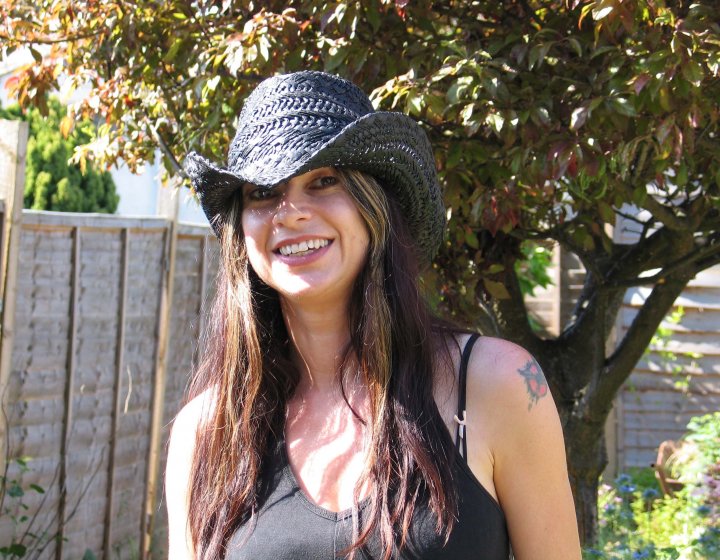 Tanya Krzywinska staff profile image with a hat