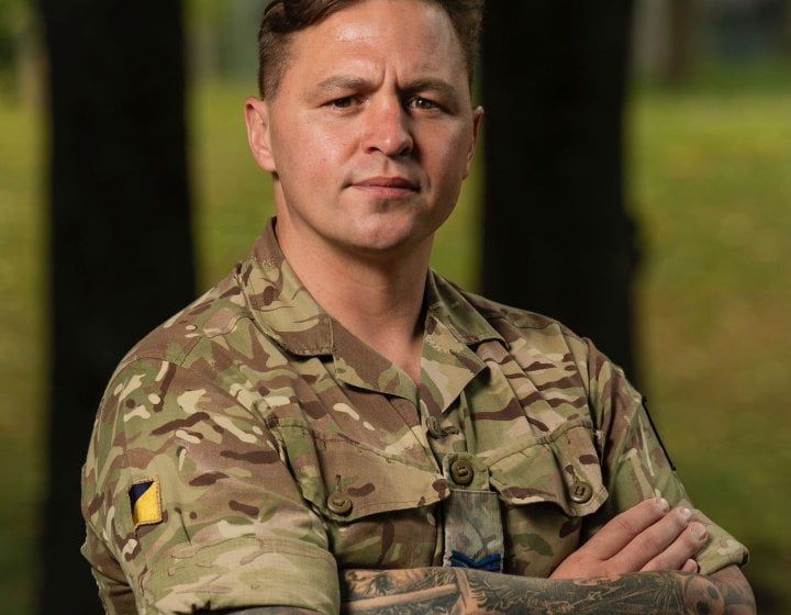 A man wearing camo