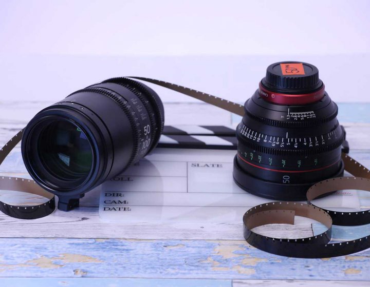 Two camera lens on a table 