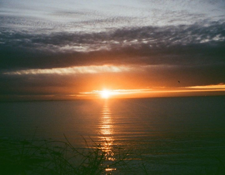 Orange sunset over the sea in Cornwall