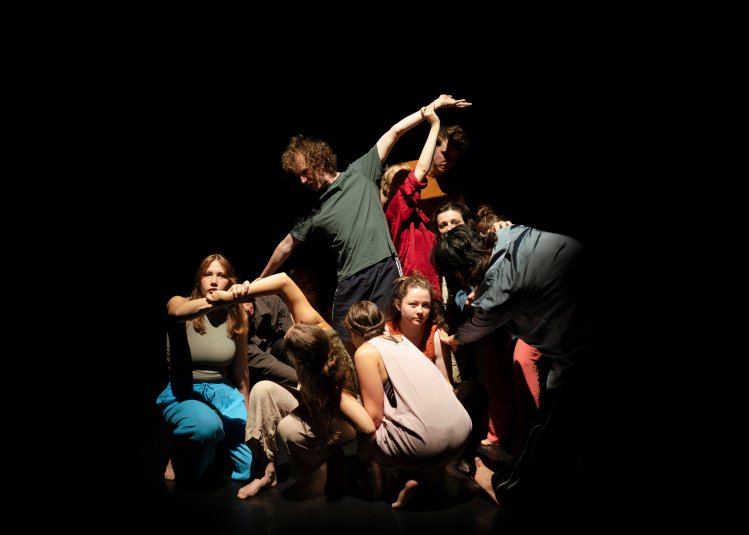 A group of performers on stage