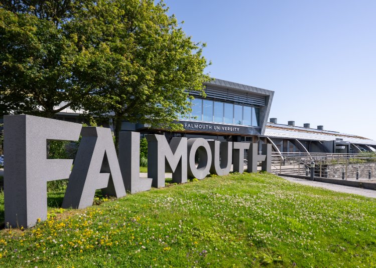 External shot of Falmouth University logo signage on campus