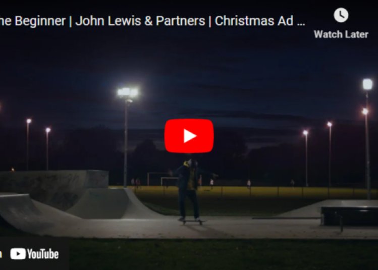 A man on a skateboard at night