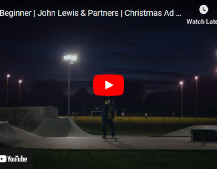 A man on a skateboard at night