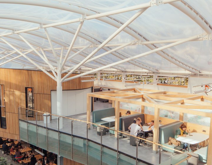 Students sit in a cafe