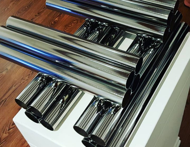 Artwork by student with chrome plated pipes