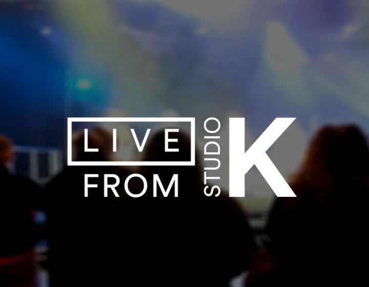 Blurred photo of an audience from behind, with the text 'Live from Studio K' overlaid in white.