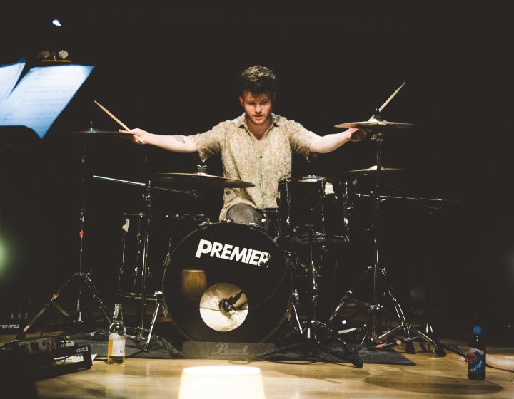 Popular music student playing drums