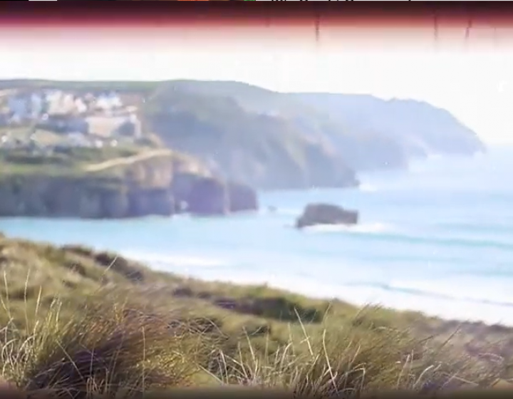 Still from graduate's student life video showing view over Cornish cliffs to the sea.