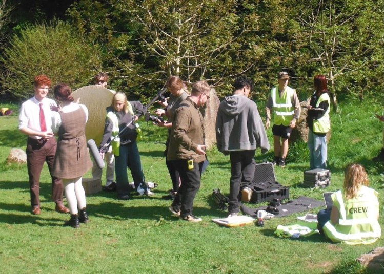 A group of students at Falmouth University preparing filming equipment