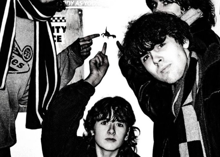 a black and white image of the band Morning, Cat