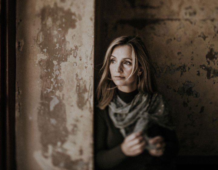 A sepia tone image of the singer Cara Dillon