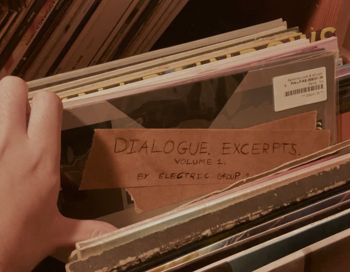 A collection of vinyl in a storage case