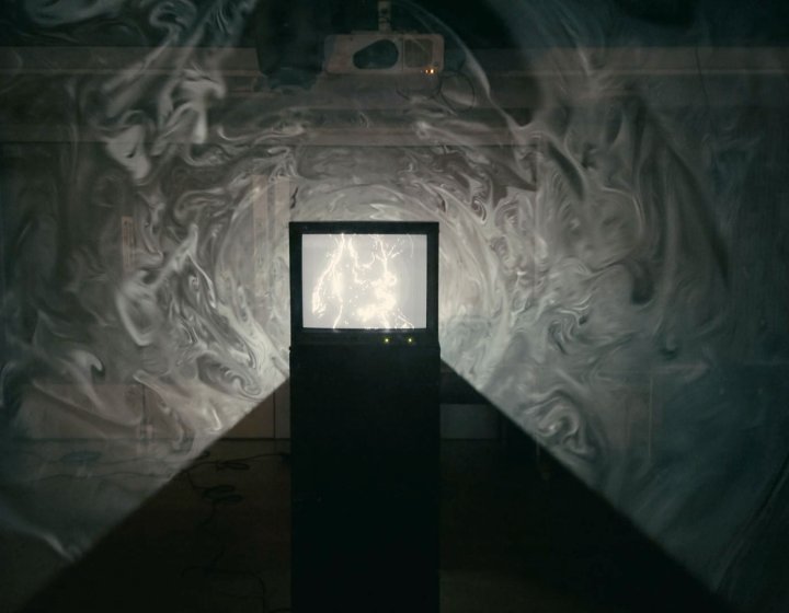 A silhouette of a TV in black and white 