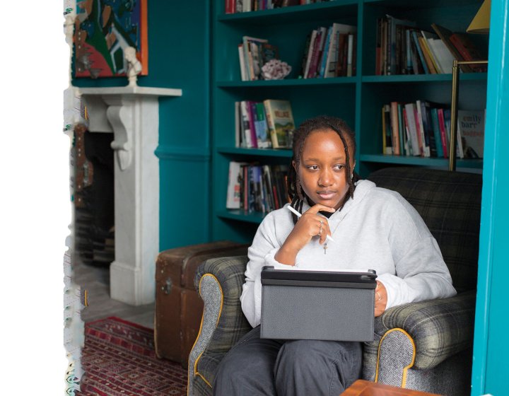 Digital marketing student working on laptop