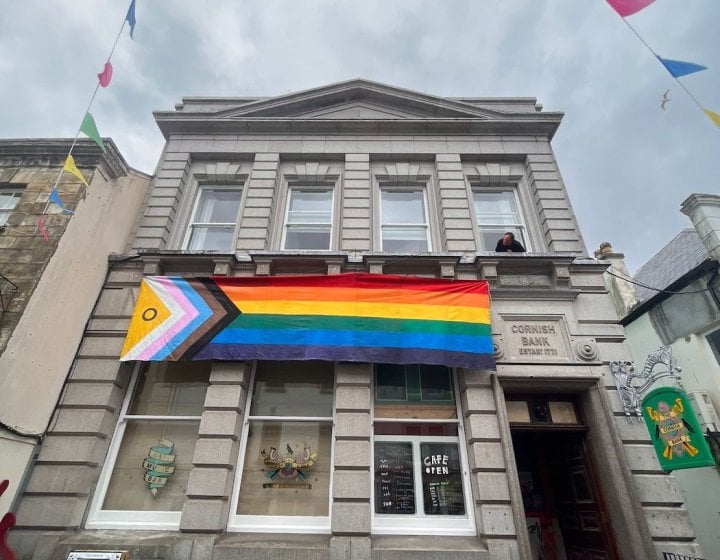 The Cornish Bank exterior building with pride flag