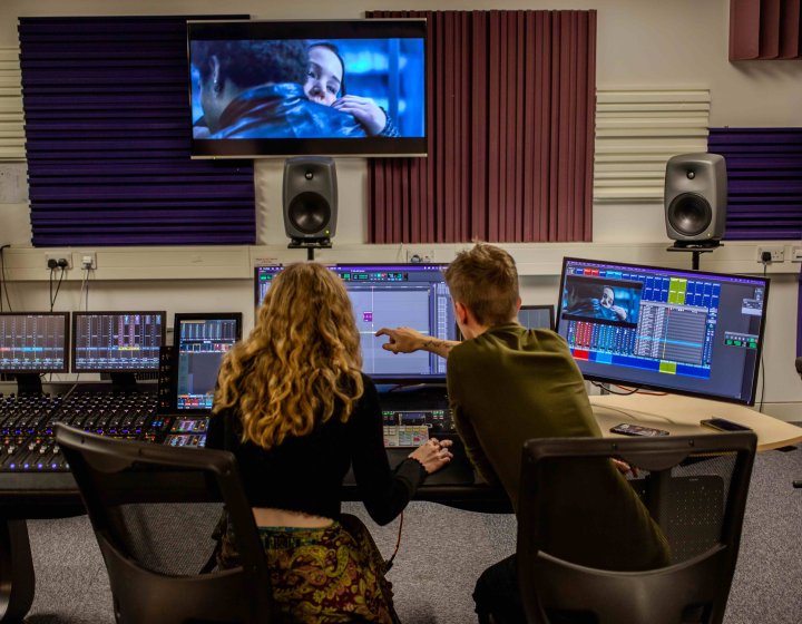 Film students in dubbing suite