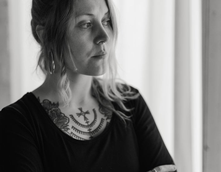 A woman stood in her studio