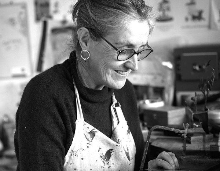 A woman at a workbench