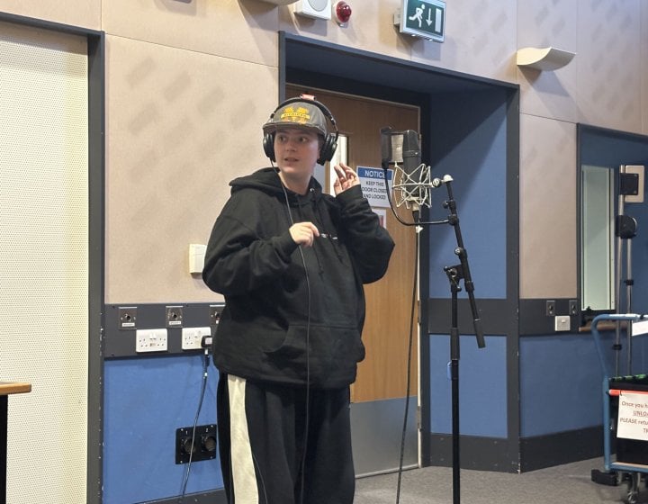 A Musical Theatre student in the recording studio at Falmouth University