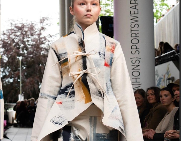 A model wearing a kimono on the catwalk