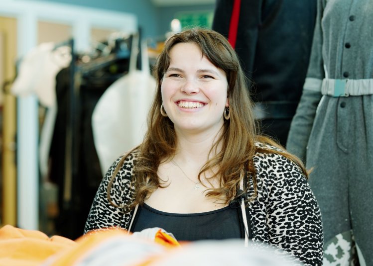 A student in the costume studio
