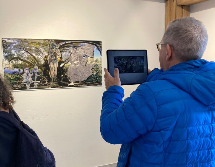 Visitor engaging with AR experience at Tremenheere