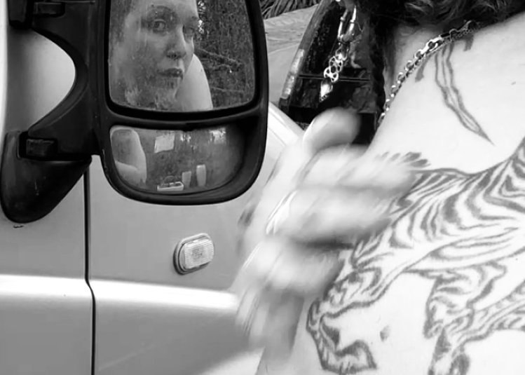 A woman looking out the car window