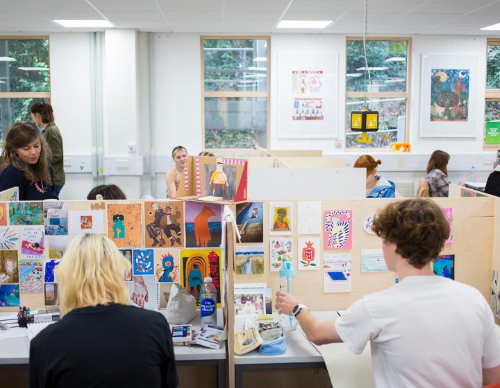 Students working in illustration studios at Falmouth University