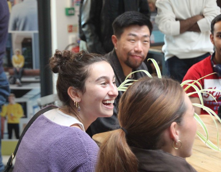 International students chatting at a table