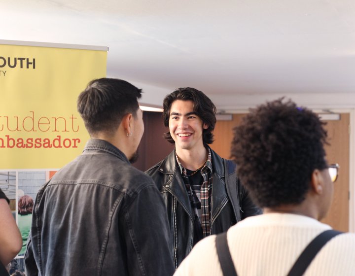 International students chatting at a table