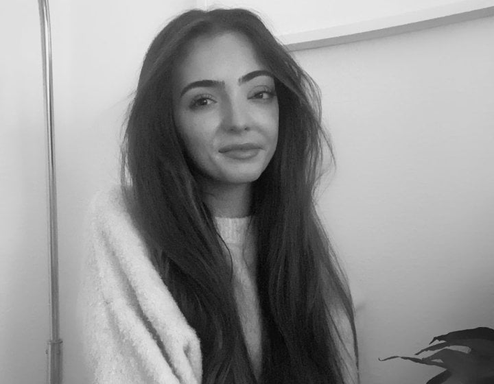 A headshot of designer
