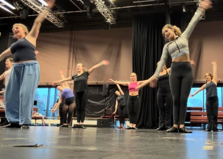 A group of Musical Theatre students dancing in a studio at Falmouth University