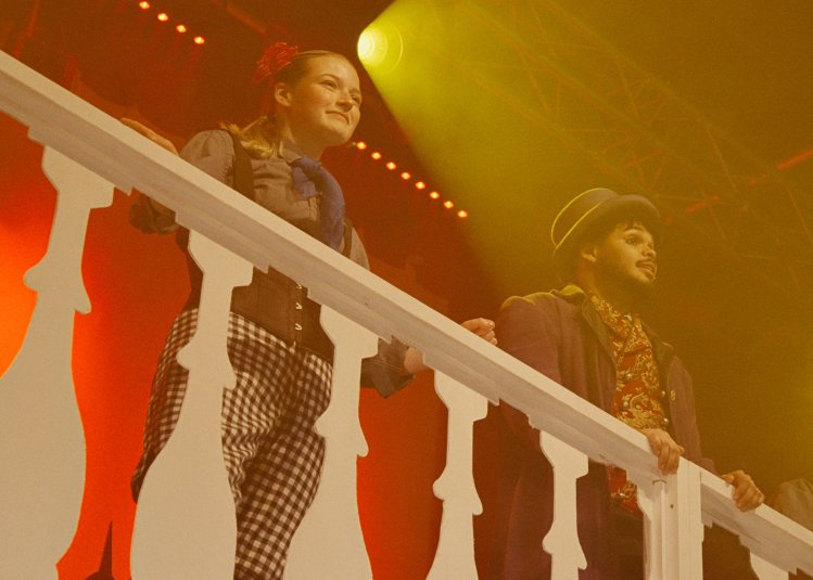 Image of two actors on stage