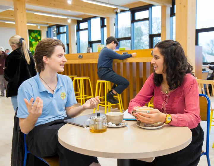 Students sitting in lounge