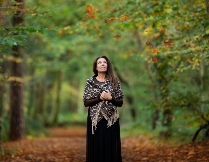 A woman stood in a forest