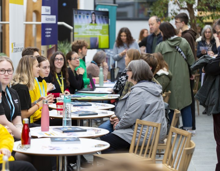 People talking at an Open Day