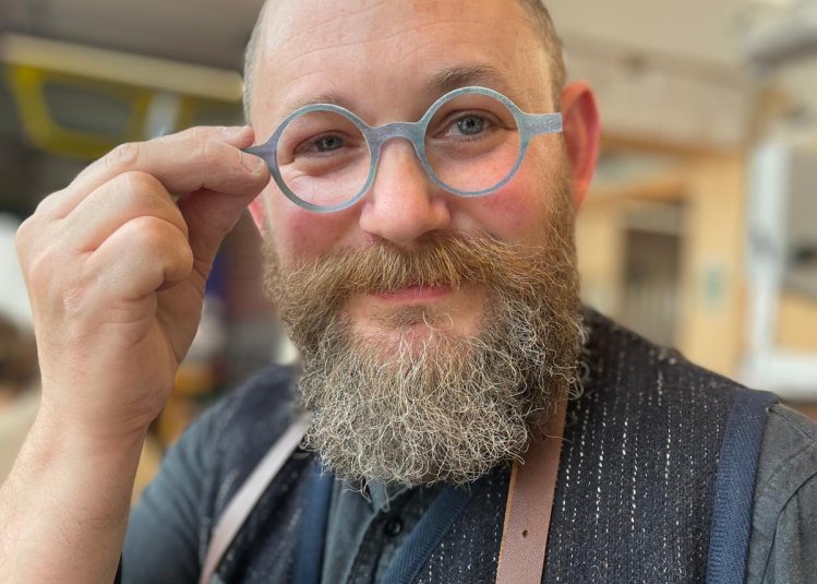 A man wearing glasses