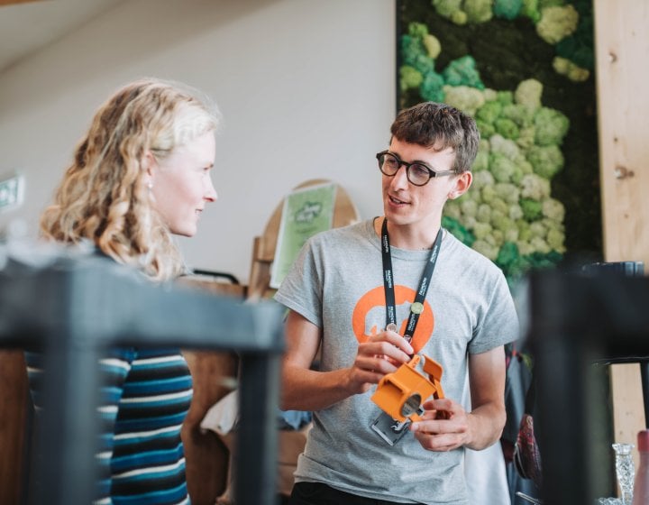 Jake Causley talking to a student