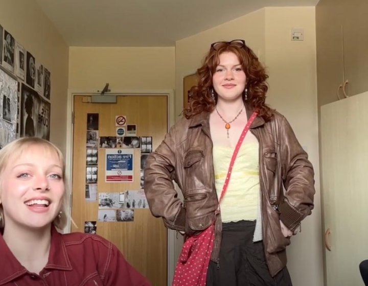 Two Falmouth University students in a student bedroom