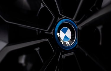 The BMW iX3 wheel shot - close up on logo