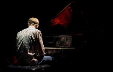student at piano