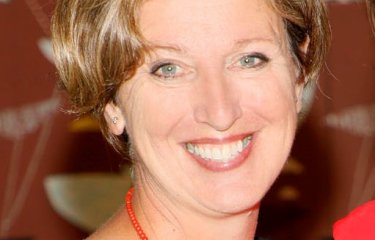 Emma Hunt smiling at camera 