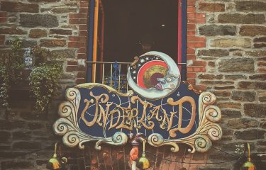 The circus-inspired sign hanging over bar and venue Underland in Falmouth