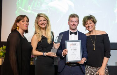 Cameron Smith receiving his award for PEGA Student Photographer of the Year