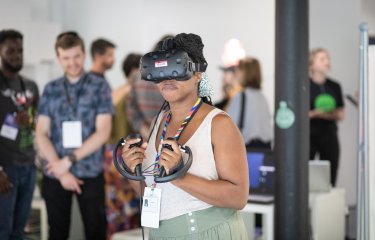 Lady using Virtual Reality equipment