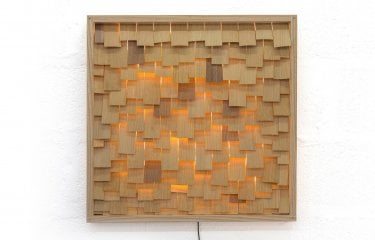Product design of a wooden frame with wooden strips illuminated