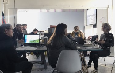 Group of students discussing the project