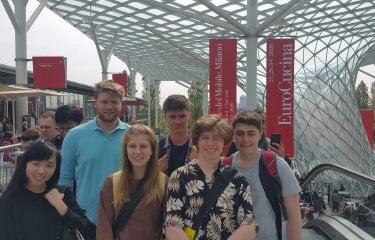 A group of Sustainable Product Design students outside the International Salone del Mobile