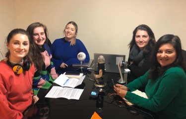 Group of women recording a podcast